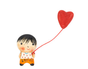 A boy and heart shape balloon on white background