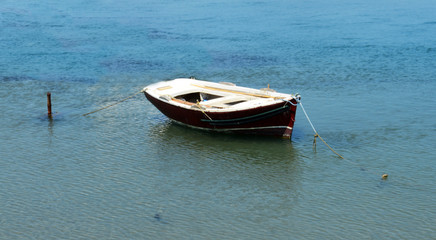 Lonely boat on the sea