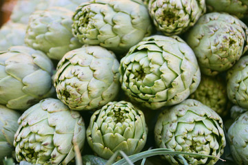 Fototapeta premium Some artichokes in a street market in a Mediterranean city of Europa.