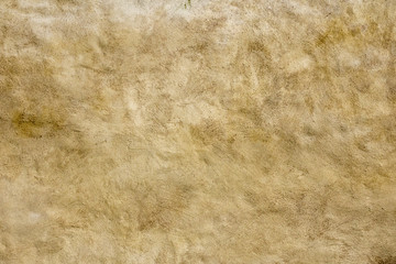 Blank stone wall background. Beige empty space with concrete texture.