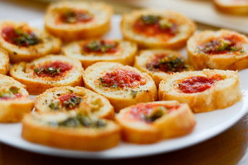Light and delicious bruschetta appetizers with tomato and oregan