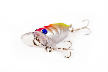 Fishing lure isolated on white. Wobbler in three color. Blue, yellow and red colors.