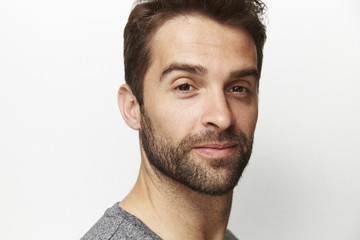 Man in portrait against white background