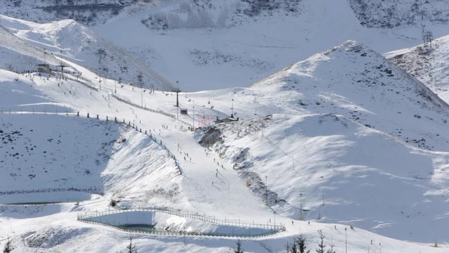 Ski slope in a sunny winter day on Alps in Italy