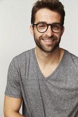 Happy man smiling grey t-shirt, portrait