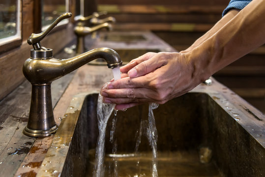 Hand Washing On Brass Faucet Vintage Style