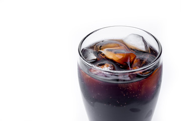 Ice cola with splashing, bubbles. Drink with ice.