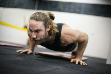  Man  working out in the gym.