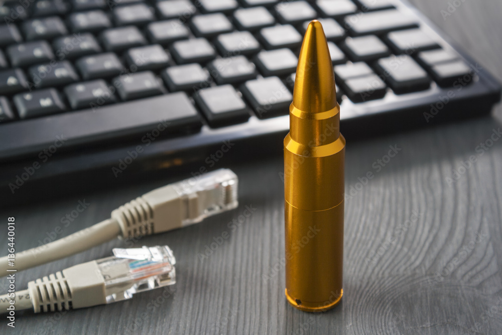 Poster concept attacks internet. keyboard with network cable.