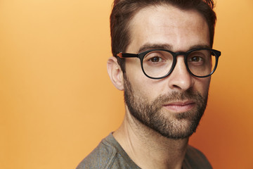 Obraz premium Spectacles on serious man in portrait