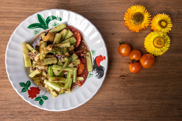 paper flower on wood background .
