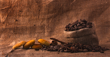 bag of coffee grains, dried fruits, and lying next