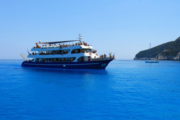 holidays, blue color, ship sea and clouds in Lefkada island, Porto Katsiki , Greece