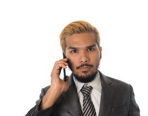 Handsome businessman use mobile phone isolated on white.