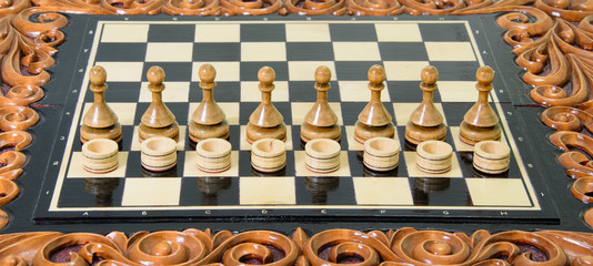 The chess pieces are placed on the chessboard