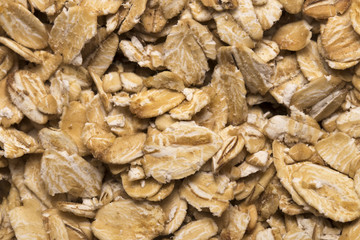 The texture of oatmeal. Oat flakes photo, oat background. oatmea