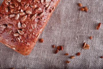 Fresh bread with cereals top view