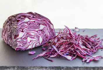 Obraz premium Shredded red cabbage. Chopped up a head of red cabbage and cut i