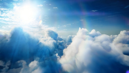 Flying over the timelapse clouds with the afternoon sun. Flight through moving cloudscape with beautiful lens flare. Traveling by air. Perfect for cinema, background