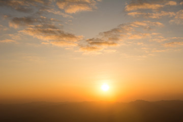 Fototapeta na wymiar Sunset at the Mountain Hill,Beautiful sunlight, Golden lights background