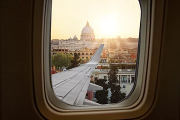 Fototapeten Blick auf Rom aus dem Flugzeugfenster © ambrozinio