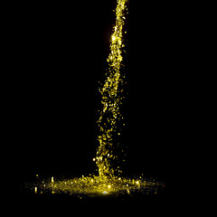 Golden glitter flakes falling, isolated on black background