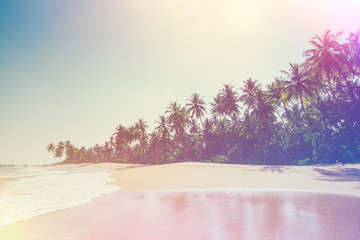 Beautiful beach on tropical island vintage stylized with film light leaks