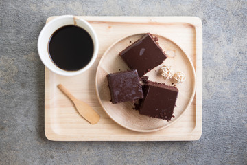 Delicious chocolate cake served with hot coffee