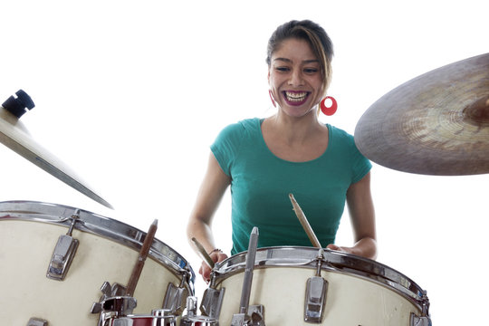 Brunette Brazilian Woman Plays The Drums In Studio