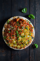 Pizza with mozzarella and cherry tomatoes