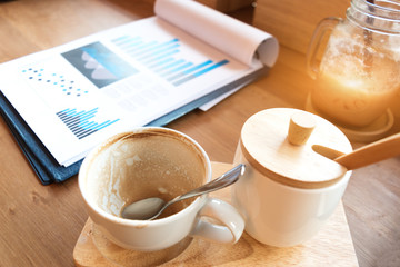 warm vintage concept : empty hot cappuccino coffee cup in cafe s