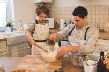 A father and his son cooking