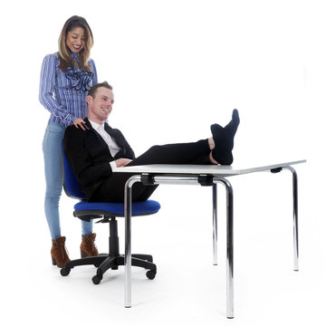 Young Woman Gives Boss Massage On Office Chair And He Has His Fe