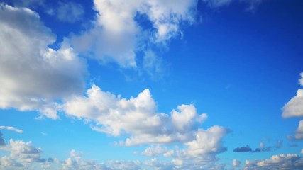 Timelapse shot of beautiful clouds rolling over sky. Aerial footage of cloudscape against blue sky. Idyllic view of nature on sunny day. 4K resolution.
