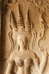 Detail of sculpted stone in Angkor Wat. Relief on the wall in temple. Cambodia