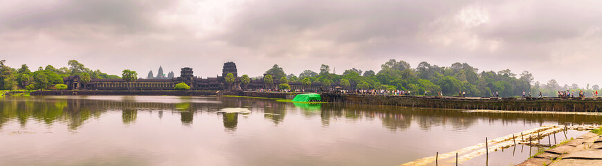 Angkor Wat temple with reflecting in water. Panoramic view