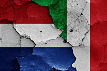 flags of Netherlands and Italy  painted on cracked wall
