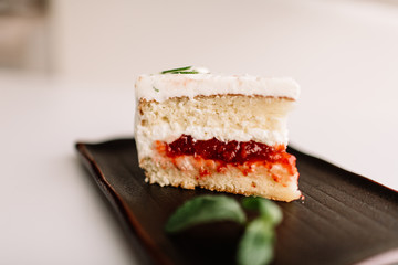 a piece of cake on dark dish