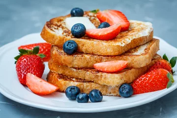 Selbstklebende Fototapeten French toast with berries. Love for a healthy desserts concept. © vaaseenaa