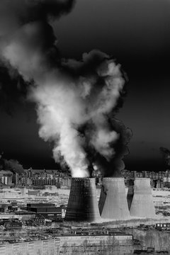 Industrial landscape with factory pipe polluting air, smoke from chimneys. The destruction of the ozone layer. The Solarize effect