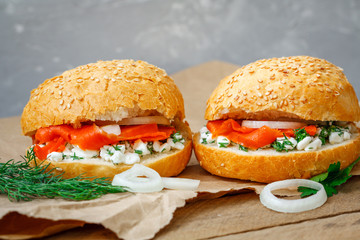 Sandwiches with salmon, cream cheese and vegetables. Love for a healthy food concept