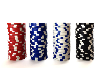 Casino chips in column isolated on white background