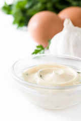 Aioli sauce and ingredients isolated on white background
