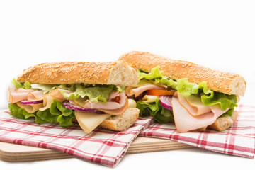 Sandwich with turkey roast, cheese and vegetables