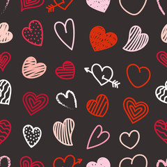 Different Valentines day hand-drawn hearts seamless pattern. Ske