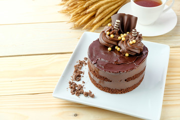 chocolate cake on wooden background