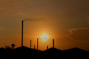 sunset on a factory roof