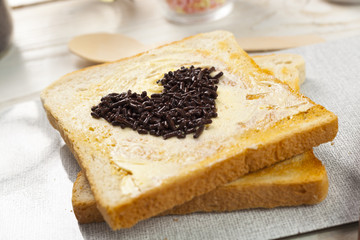 outdoor spring breakfast sweet bread spread on wooden table