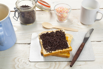 outdoor spring breakfast sweet bread spread on wooden table