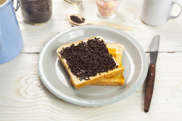 outdoor spring breakfast sweet bread spread on wooden table